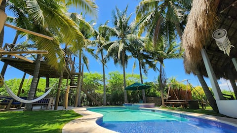 Blue Beach House
(1 min from the beach)