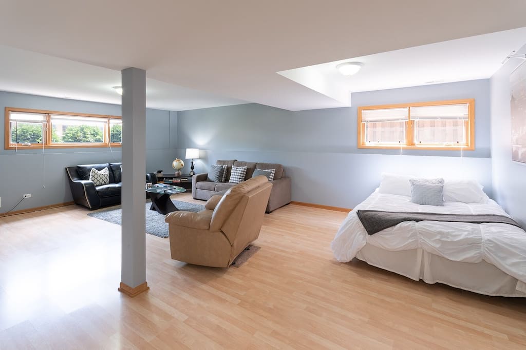 The living room boasts an queen size bed to accommodate more guests.