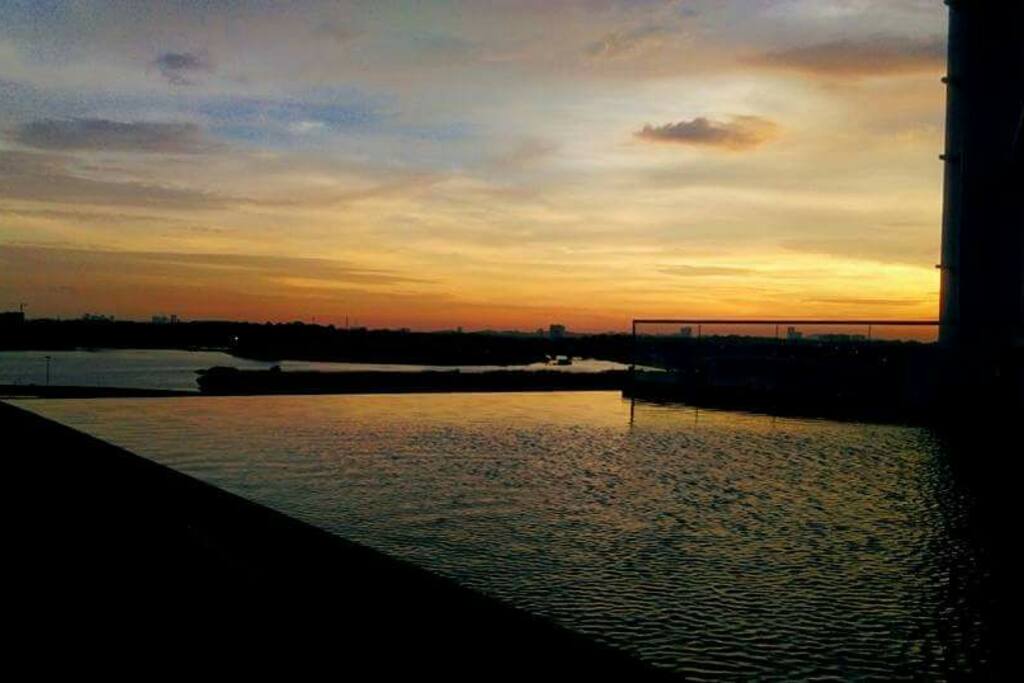 Luxuriate in the Infinity Pool that overlooks the sunset at sea of the Straits of Johor.