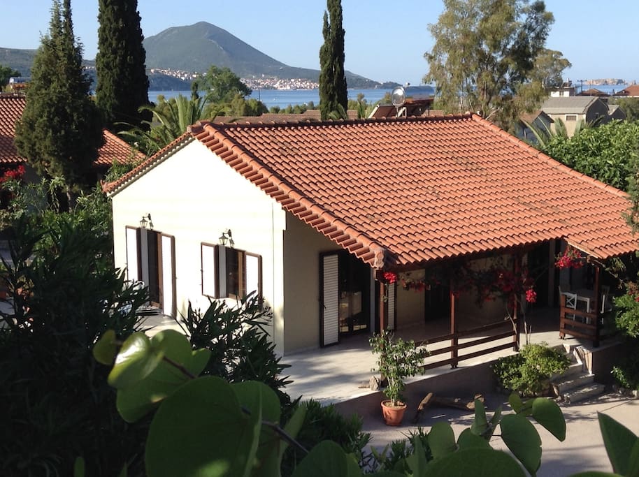 Above the roof you see the beautiful city Pylos