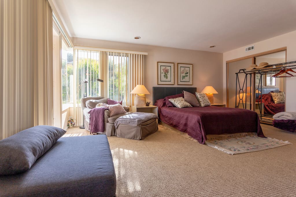 Shows second bed , the ottoman, and reading nook