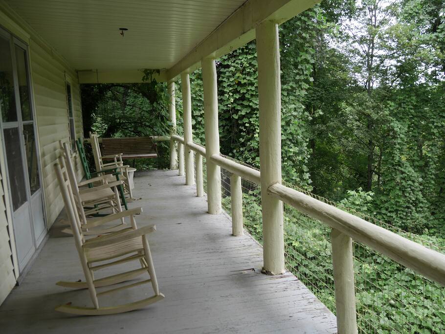 Our front porch overlooks the woods leading down to Flat Creek.