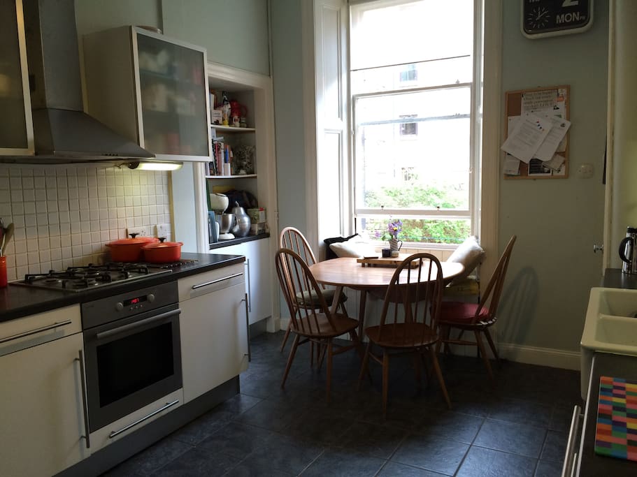 Kitchen with dining table to seat 4.