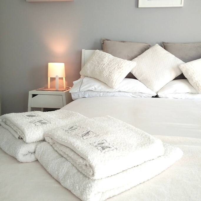 Fresh and crisp white bed linen provided.
