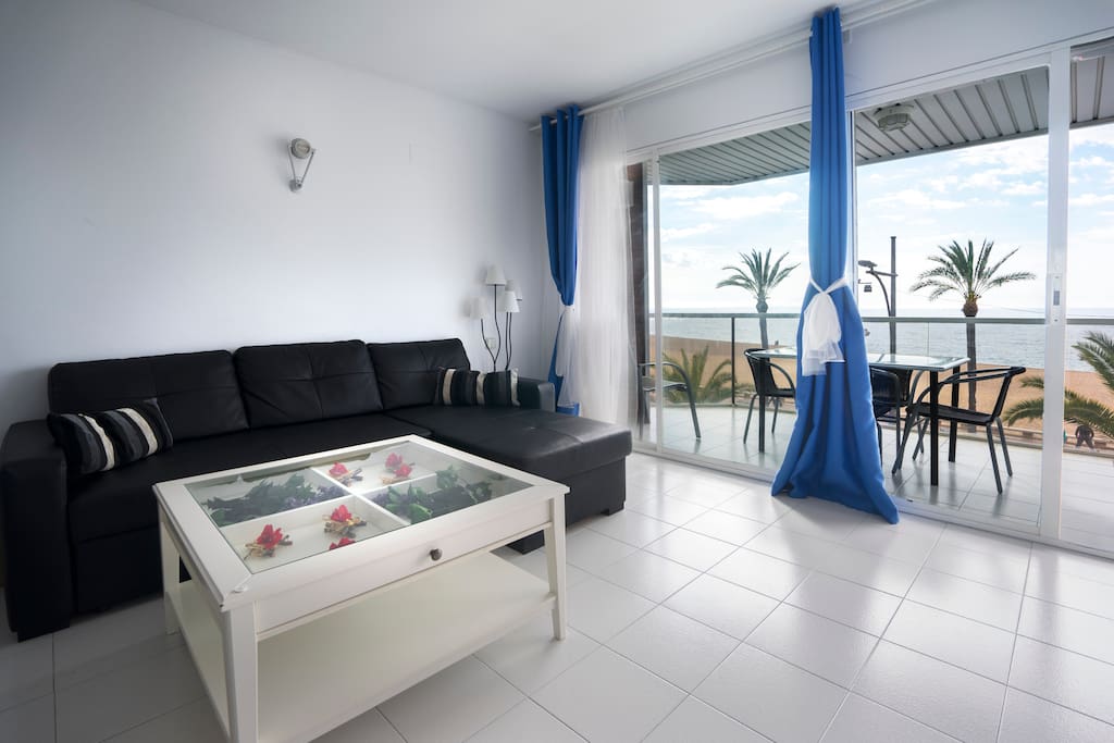 Living room beachfront and sea views