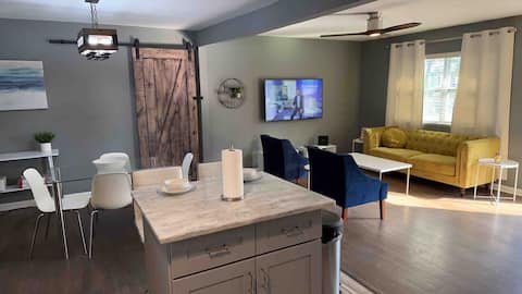 Stylish & Spacious Retreat Near Airport & Downtown