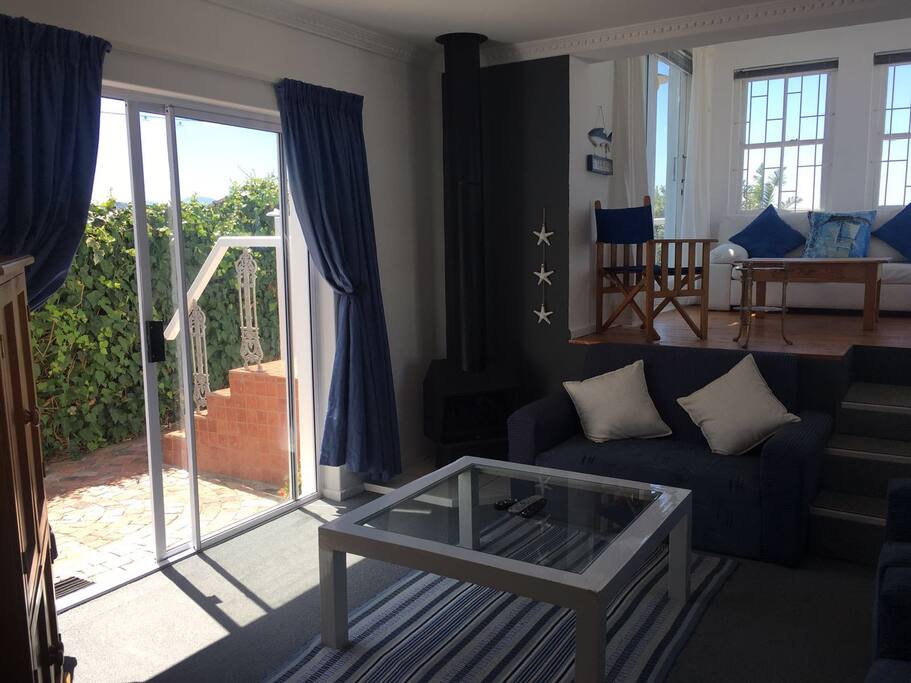 The lounge, sunroom and kitchen lead out to a viewing deck and garden