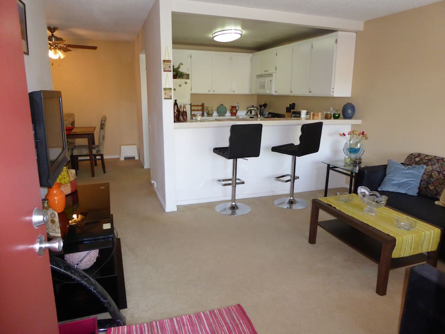 Entrance, Living Room, TV, chairs, 2 couches