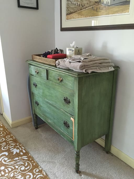 Your bedroom has an open bureau with fresh towels, and travel necessities like iron and hair-dryer.