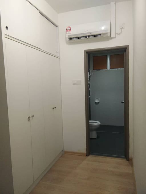 Built-in closet for clothes and luggage. Also, the air-conditioned inside the room.