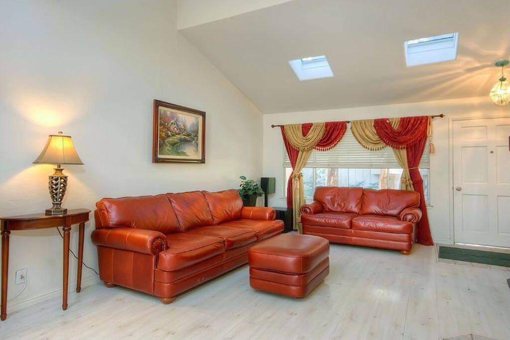 Living room with a large screen TV