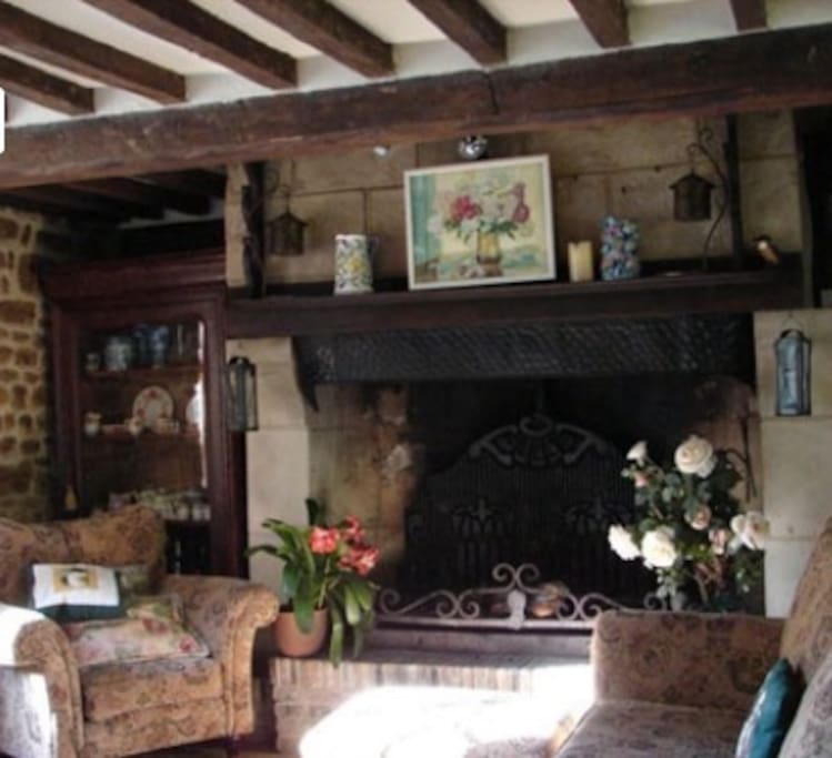 Huge fireplace in sitting room.