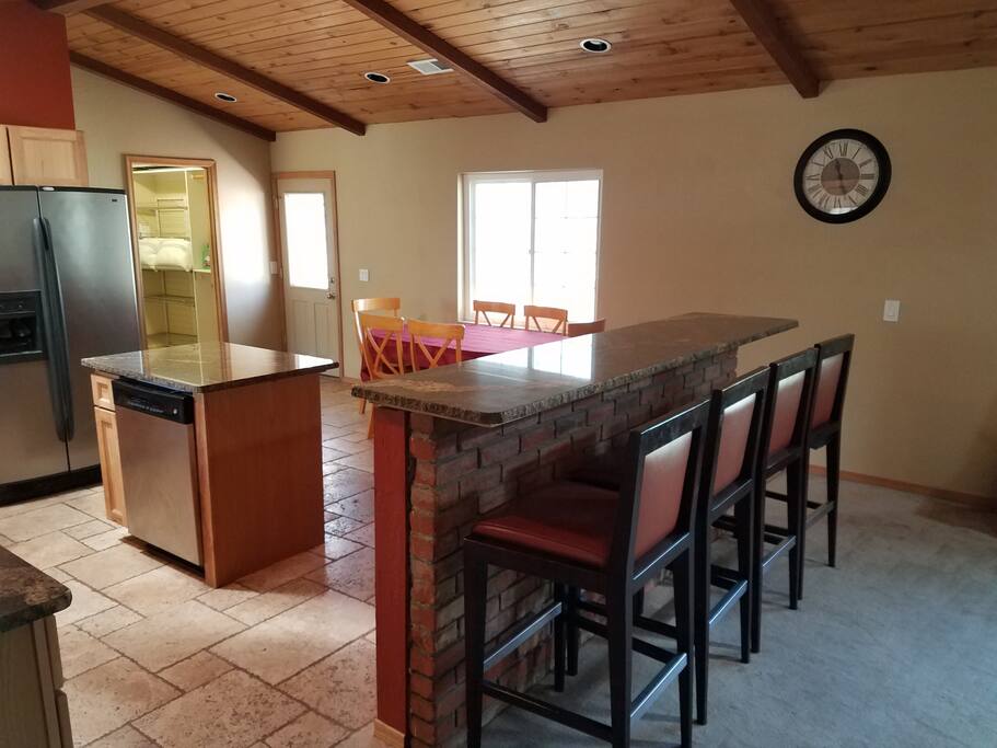 Newly redone granite counter tops and tile floor.