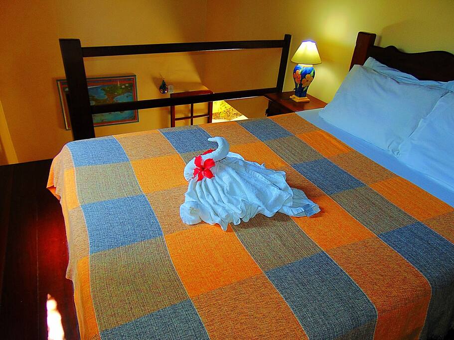 Apartamento dúplex, quarto com cama casal no mezanino