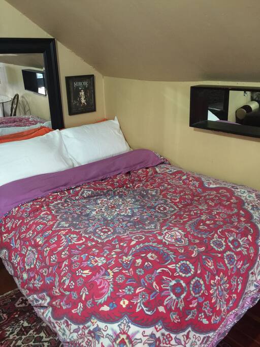 Cozy pillow top mattress with extra pillows and duvet