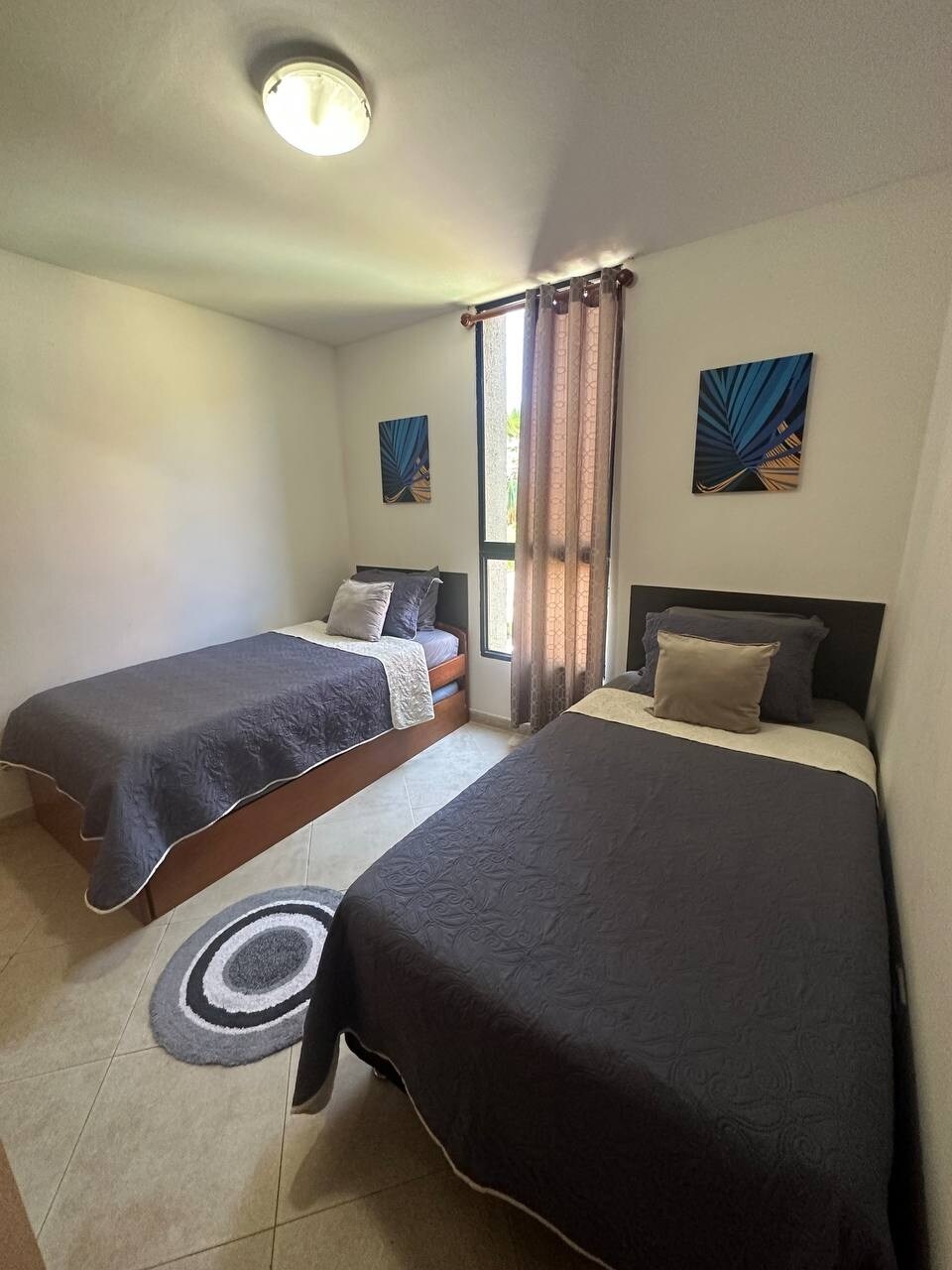 Chambre 3 lits simples