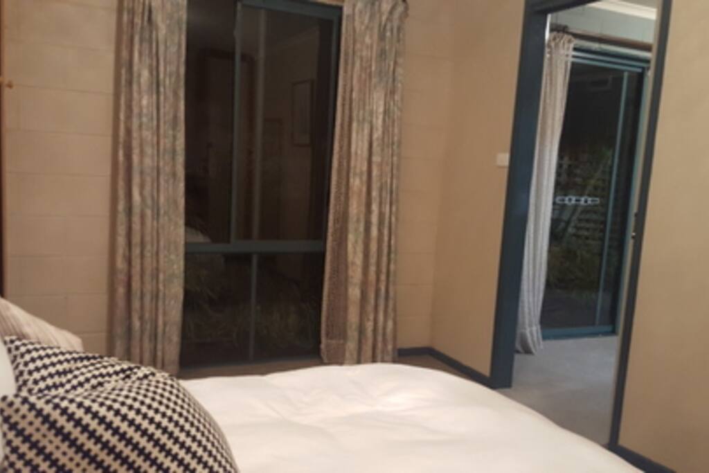Bedroom window with Door to Living Space
