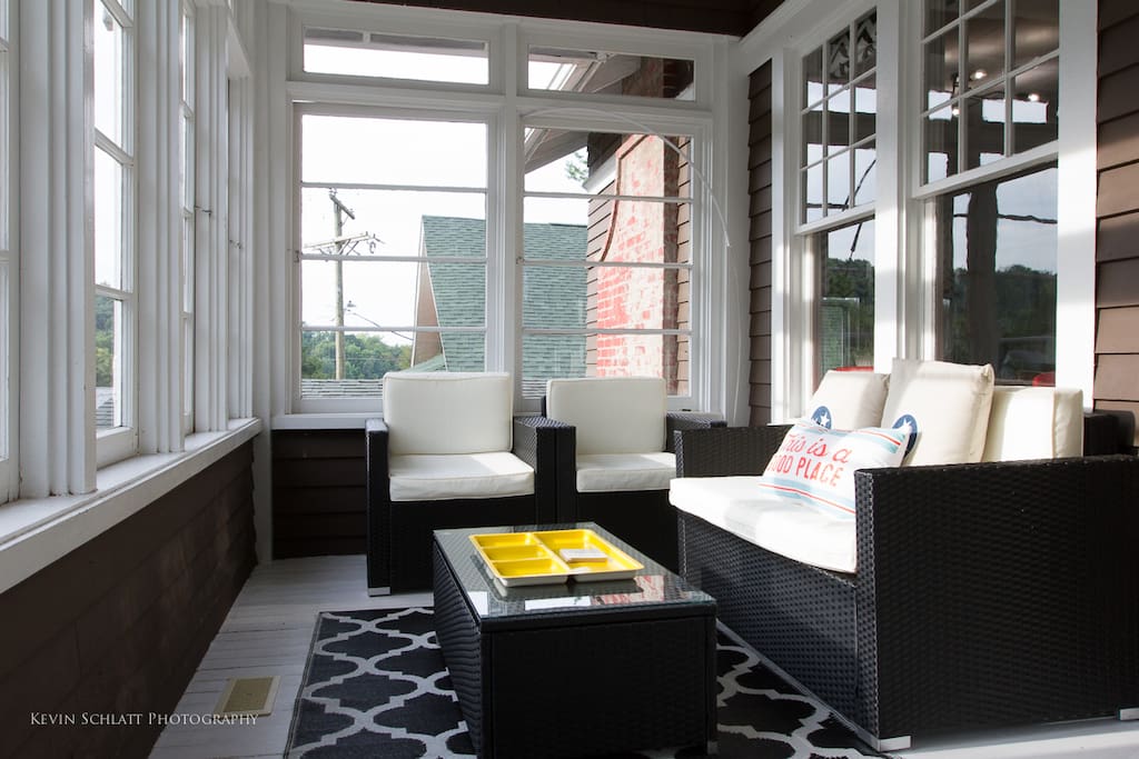 The front porch is completely screened in which is perfect for relaxing in the sun without the bugs.