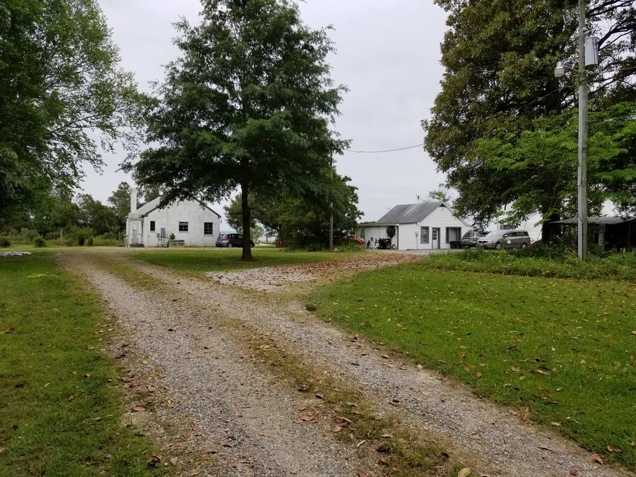 Cottage is the building on the left