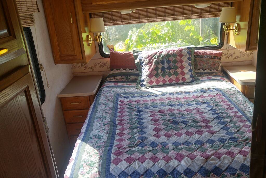 The walk around queen sized bed.