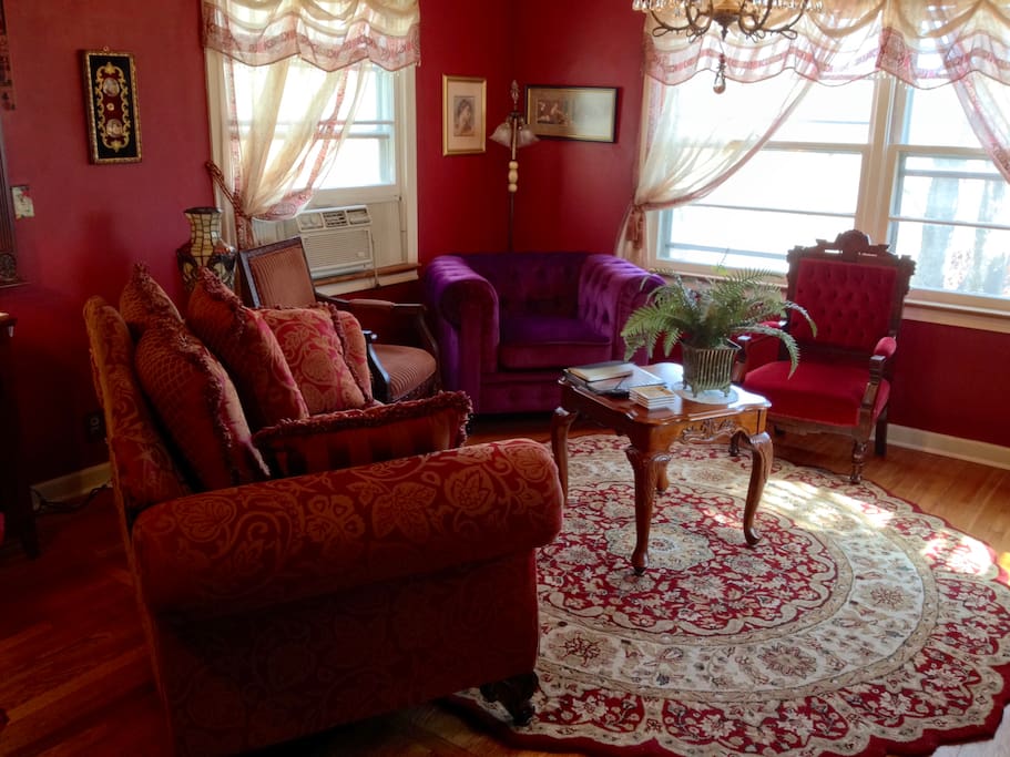 Another view of living room with antique chair