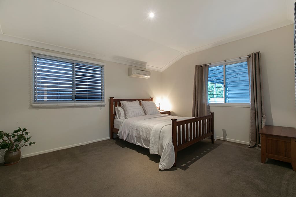 Room 1: Huge room with Queen Bed + with built in cupboards and air conditioning.