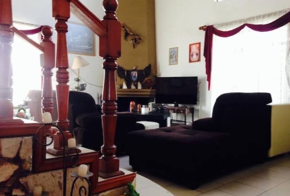 Living room with TV and sofas , netflix is included!