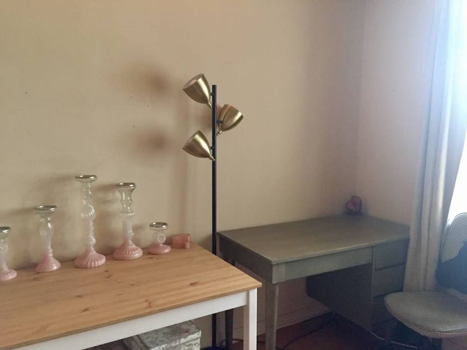 Desk space is emptied for guests to use. Great for writers. Very nice sturdy desk with wifi. Beautiful candles holders, feel free to use.