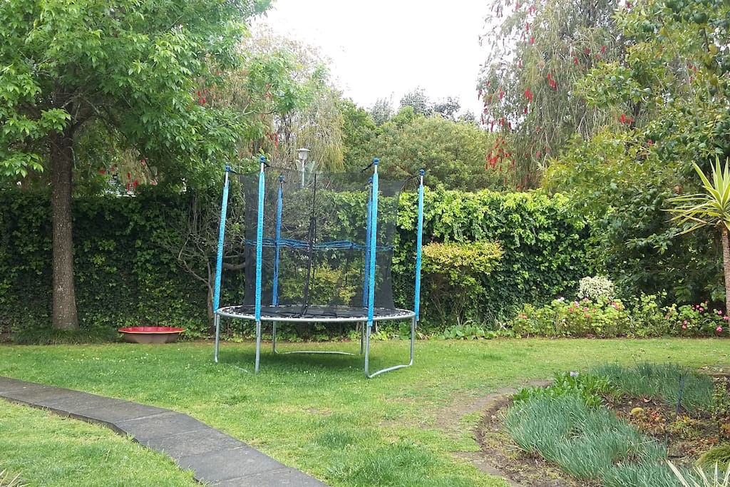 Outside garden and trampoline for kids