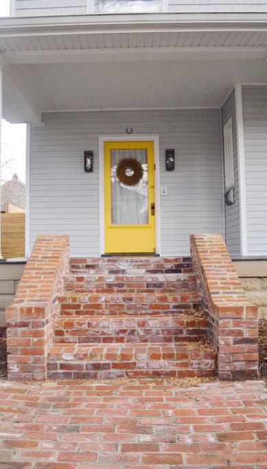 Yellow Front Door & Edison Bulb Sconces