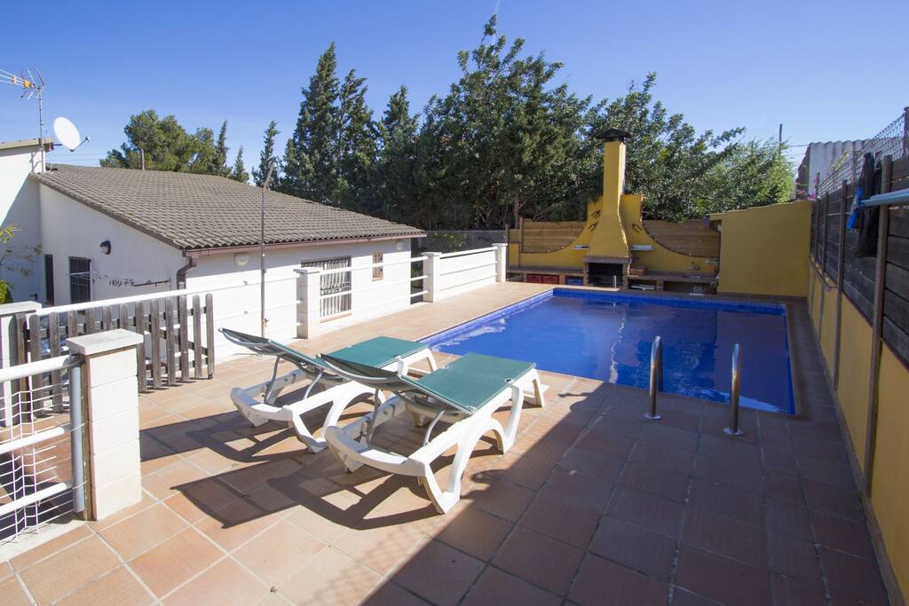 Swimming pool and sunbeds