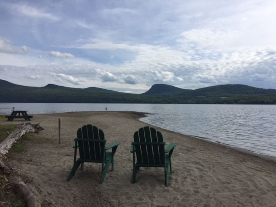 The lake and mountain views on the 400-foot private beach are truly spectacular!