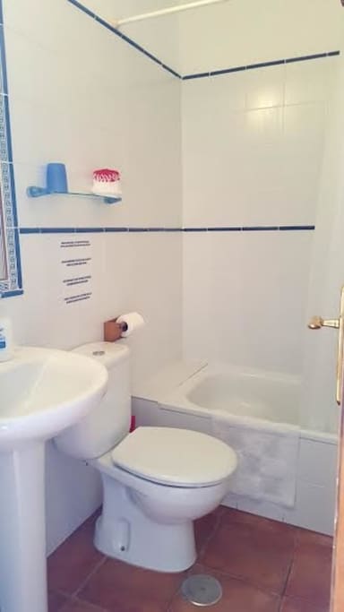 Shower room with a half bath.