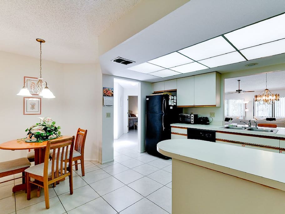 Full, bright kitchen with serving window.