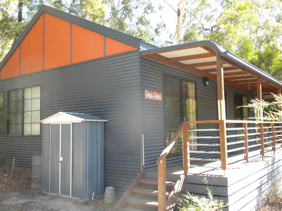 Wood shed outside - wood heater inside