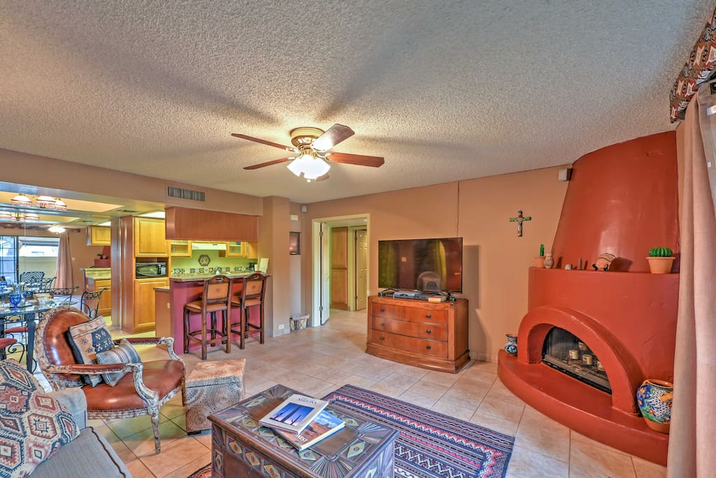 Spend quality time with loved ones in the living room as the red clay fireplace warms the room.