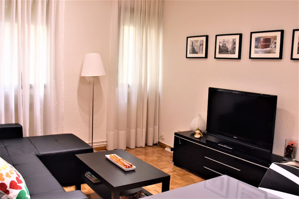 Salon TV y sofa cama