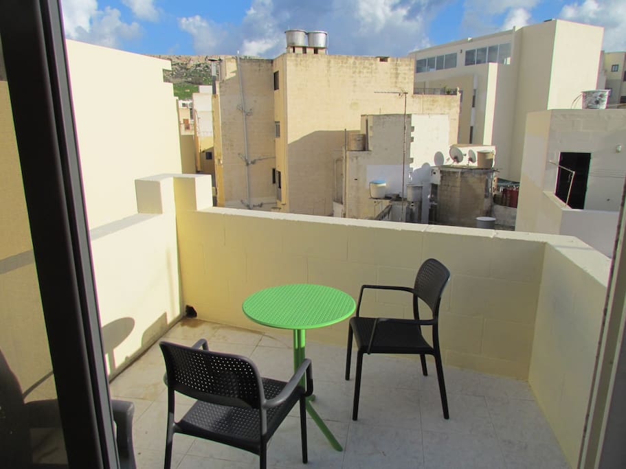 East facing outside terrace with new chairs and table
