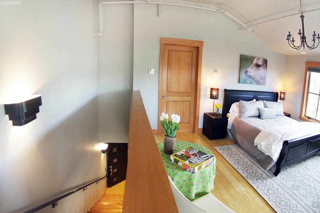 Second-level bedroom with stairs