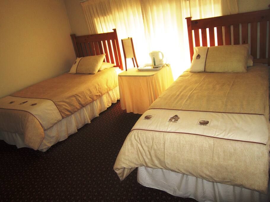 This is one of our Sharing Rooms, 2 x Single beds