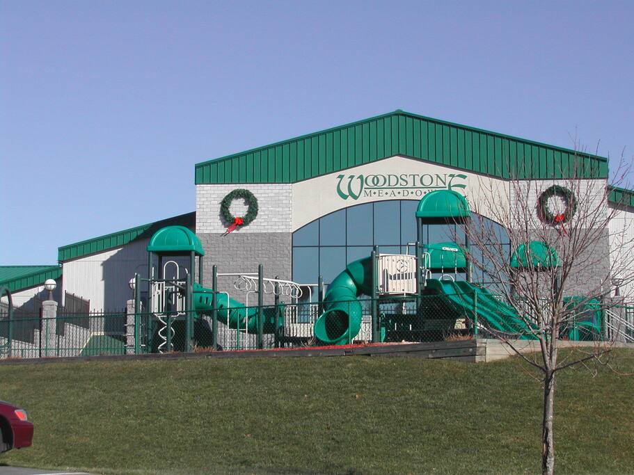 One of the two rec centers that feature indoor/outdoor pools, tennis courts, basketball courts, fitness room, game room, sauna/hot tub, kids club, escape rooms and instructional programs