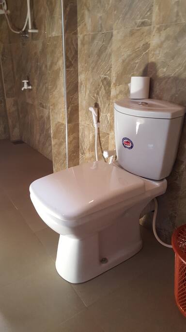Modern toilet in the private bathroom