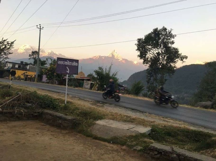 Front road with Annapurna mountain range view