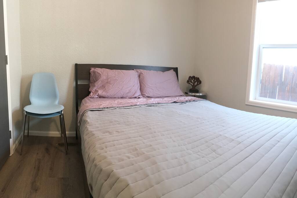 Full size bed with a twin mattress under bed