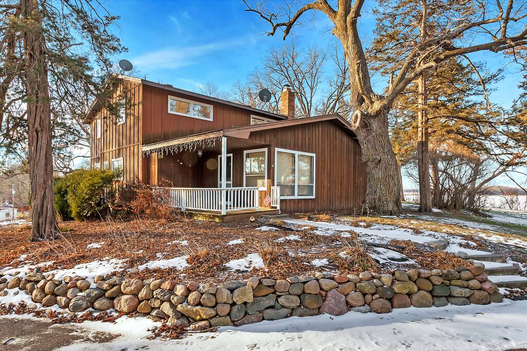 Front covered patio main entrance with keyless entry. Enter main level of lodge here.