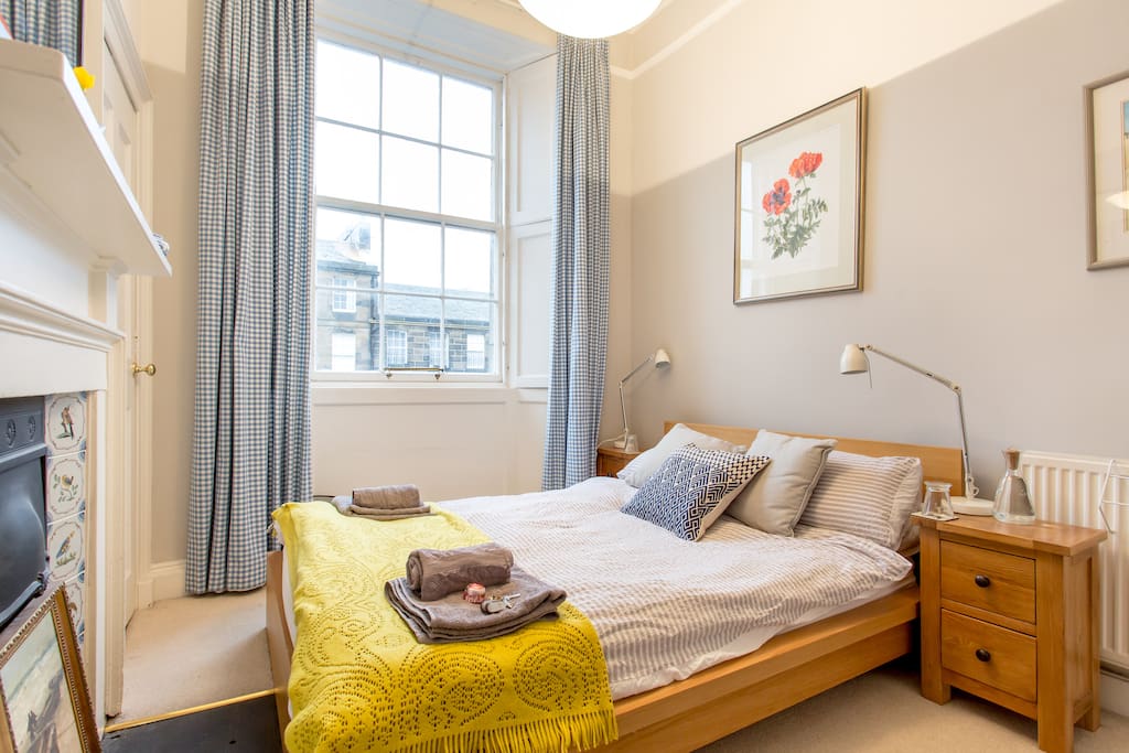 Comfy double bed which enjoys the afternoon sun