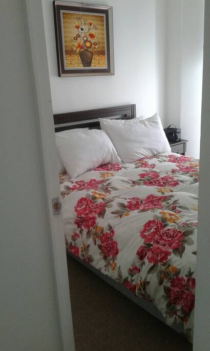 dormitorio principal con TV