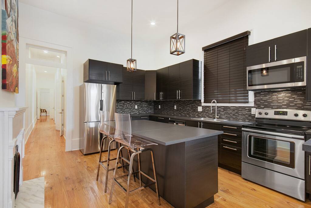 Well appointed kitchen with all stainless appliances! Coffee maker, toaster, microwave, oven, stove and all the necessary utensils, plates etc. to enjoy a great meal with family & friends!