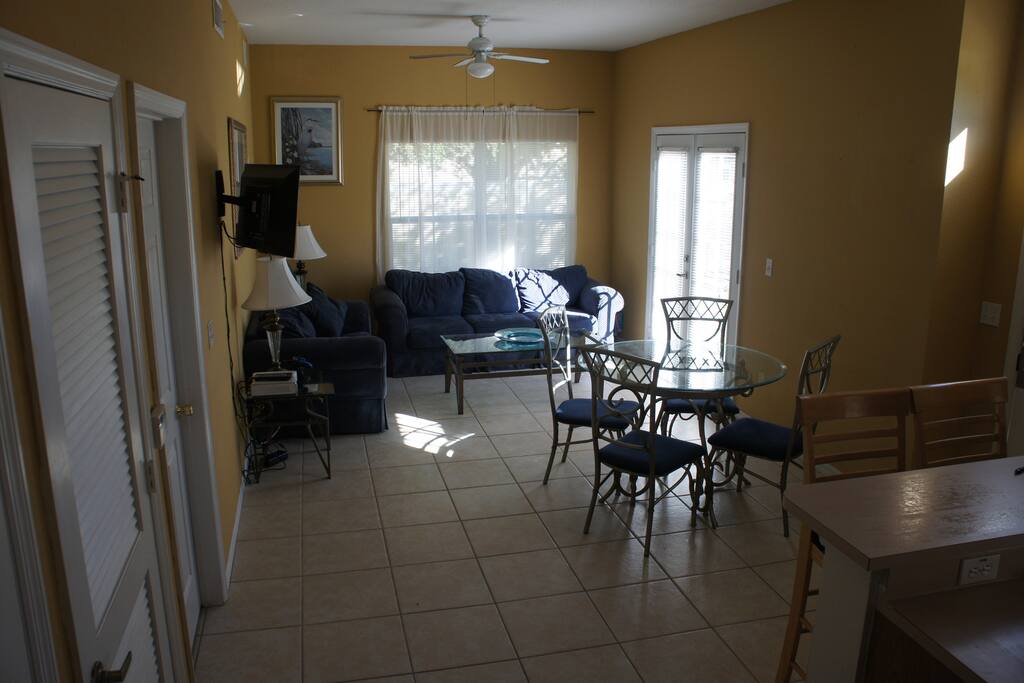 Open Plan Lounge Dining area with a comfortable queen size sofa bed