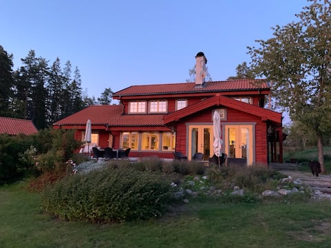 Secluded summer idyll, private jetty and sunset